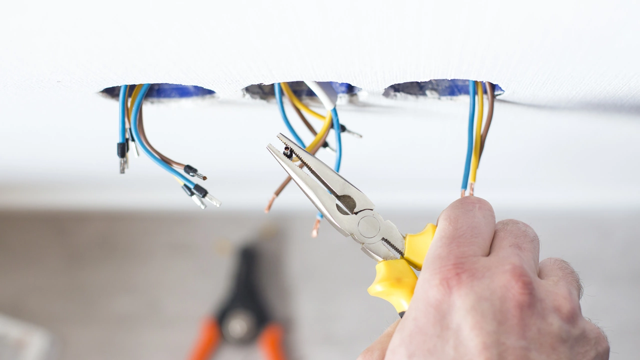 Do you need an electrician to change a light?